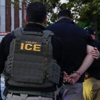 Illustrative: US Immigration and Customs Enforcement agents make an arrest during an early morning operation in Park Ridge, Ill., September 19, 2025. (AP Photo/Erin Hooley) Illustrative: US Immigration and Customs Enforcement agents make an arrest during an early morning operation in Park Ridge, Ill., September 19, 2025. (AP Photo/Erin Hooley)