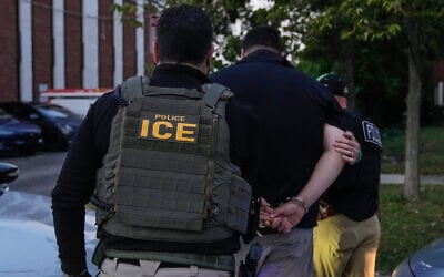 Illustrative: US Immigration and Customs Enforcement agents make an arrest during an early morning operation in Park Ridge, Ill., September 19, 2025. (AP Photo/Erin Hooley)