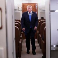 US President Donald Trump walks to speak to reporters onboard Air Force One while returning to the White House, August 2, 2026. (AP Photo/Jacquelyn Martin)