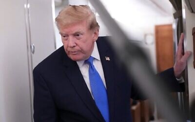 US President Donald Trump speaks to reporters onboard Air Force One while returning to the White House, August 2, 2026. (AP Photo/Jacquelyn Martin) US President Donald Trump speaks to reporters onboard Air Force One while returning to the White House, August 2, 2026. (AP Photo/Jacquelyn Martin)