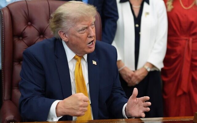 US President Donald Trump gestures as he speaks in the Oval Office of the White House, August 3, 2026, in Washington. (AP/Alex Brandon)