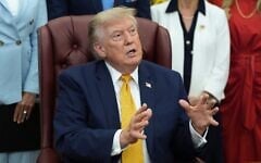 President Donald Trump speaks during a meeting about military families, in the Oval Office of the White House, August 3, 2026, in Washington. (AP Photo/Alex Brandon)