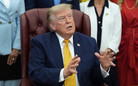 President Donald Trump speaks during a meeting about military families, in the Oval Office of the White House, August 3, 2026, in Washington. (AP Photo/Alex Brandon)