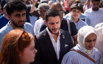 Abdul El-Sayed departs following a news conference at the Spirit of Detroit shortly after winning the Democratic nomination for US Senate in Michigan, August 5, 2026, in Detroit. (AP Photo/Julia Demaree Nikhinson)