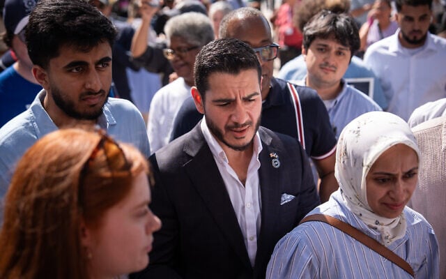 Abdul El-Sayed departs following a news conference at the Spirit of Detroit shortly after winning the Democratic nomination for US Senate in Michigan, August 5, 2026, in Detroit. (AP Photo/Julia Demaree Nikhinson)