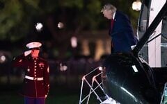US President Donald Trump steps off from Marine One upon his arrival at the Ellipse just outside of the White House, August 5, 2026, in Washington. (AP Photo/Jose Luis Magana)