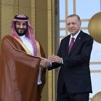 Turkish President Recep Tayyip Erdogan, right, and Saudi Crown Prince Mohammed bin Salman shake hands during a welcome ceremony, in Ankara, Turkey, June 22, 2022. (AP Photo/Burhan Ozbilici)