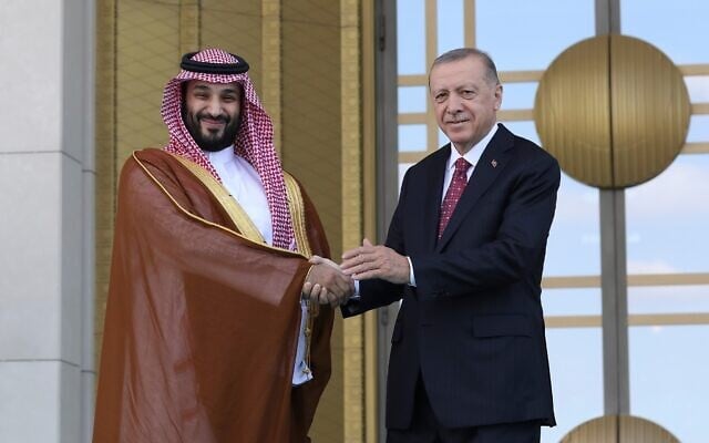 Turkish President Recep Tayyip Erdogan, right, and Saudi Crown Prince Mohammed bin Salman shake hands during a welcome ceremony, in Ankara, Turkey, June 22, 2022. (AP Photo/Burhan Ozbilici)