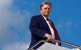 US President Donald Trump boards Air Force One at Joint Base Andrews in Maryland on August 7, 2026. (AP Photo/Julia Demaree Nikhinson)