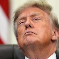 US President Donald Trump attends a meeting to sign an executive order about vaccines, August 10, 2026, in the Oval Office of the White House in Washington. (AP Photo/ Jacquelyn Martin)
