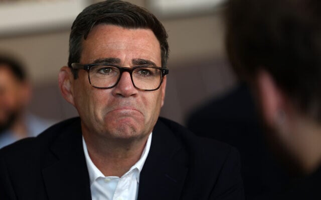 Britain’s Prime Minister Andy Burnham reacts as he meets with local business owners and guests during a visit to The Hub Cafe in Ilkeston, Derbyshire, England, August 11, 2026. (Toby Shepheard/Pool Photo via AP)