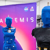 In this photo provided by NASA, Helga and Zohar, two female manikins in the Matroshka AstroRad Radiation Experiment investigation, undergo post-flight payload inspections, January 17, 2023, inside the Space Station Processing Facility at Kennedy Space Center on Merritt Island, Florida. (Kim Shiflett/NASA via AP)