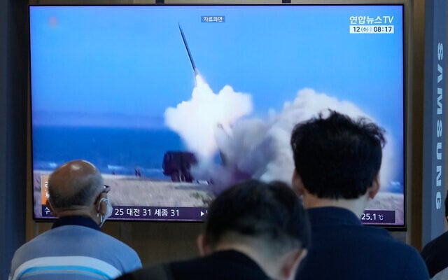 A TV screen shows a file image of North Korea’s missile launch during a news program at Seoul Railway Station in Seoul, South Korea, August 12, 2026. (AP Photo/Ahn Young-joon)