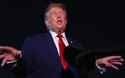 President Donald Trump talks to reporters after arriving on Air Force One, August 11, 2026, at Joint Base Andrews, Md. (AP Photo/Mark Schiefelbein)