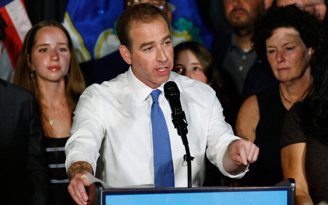 Luke Bronin, former Hartford mayor and Democratic candidate for Connecticut’s 1st congressional district, speaks during an election night watch party August 11, 2026, in Hartford, Connecticut. (AP Photo/Rusty Jones)