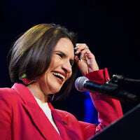 Minnesota Lt. Gov. Peggy Flanagan, a Democratic candidate for US Senate, smiles on stage during an election night watch party on August 11, 2026, in Minneapolis. (AP Photo/Ellen Schmidt)