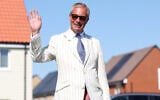 Britain’s Reform UK party leader Nigel Farage arrives at a polling station in Walton on the Naze, August 13, 2026, to cast his vote for the Clacton on Sea by-election. (AP/Richard Pelham)