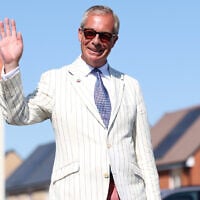 Britain’s Reform UK party leader Nigel Farage arrives at a polling station in Walton on the Naze, August 13, 2026, to cast his vote for the Clacton on Sea by-election. (AP/Richard Pelham)