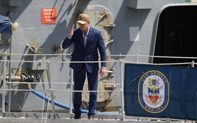 US Defense Secretary Pete Hegseth waves from a Navy ship taking part in a multinational military exercise in Panama City, August 13, 2026. (AP/Matias Delacroix)