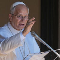 Pope Leo XIV delivers the Angelus noon prayer in Castel Gandolfo, Italy, August 16, 2026. (AP Photo/Gregorio Borgia)