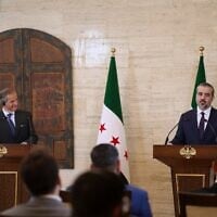 International Atomic Energy Agency’s director-general Rafael Mariano Grossi, left, and Syrian Foreign Minister Asaad al-Shibani attend a press conference in Damascus, Syria, August 18, 2026. (AP Photo/Ghaith Alsayed)