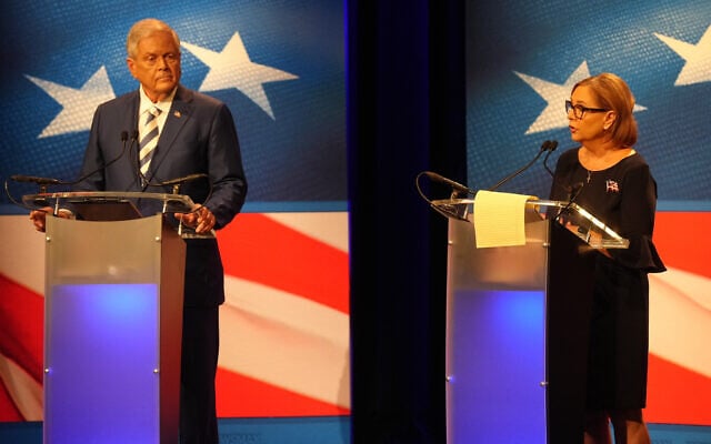 US Rep. Ralph Norman left, looks on as Senator Darline Graham speaks during a debate ahead of the special GOP Senate runoff election to replace the late senator Lindsey Graham in Newberry, South Carolina, August 18, 2026. (AP Photo/Meg Kinnard)