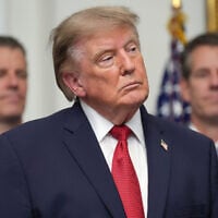 US President Donald Trump listens as Gemini co-founder and president Cameron Winklevoss, left, and Gemini co-founder and CEO Tyler Winklevoss, right, watch, during a meeting with technology leaders in the Roosevelt Room of the White House, August 19, 2026, in Washington. (AP Photo/Jacquelyn Martin)