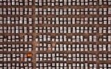 Rolled coils of steel sit in the yard at the ArcelorMittal Dofasco steel plant in Hamilton, Ont. on August 20, 2026. (Nick Iwanyshyn/The Canadian Press via AP)