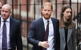 Britain’s Prince Harry arrives at London’s High Court to lead a group, including Elton John and Elizabeth Hurley, accusing the Daily Mail’s publisher of privacy invasion through unlawful tactics in a trial that is part of a wider phone hacking scandal in London, January 21, 2026. (AP Photo/Kirsty Wigglesworth)