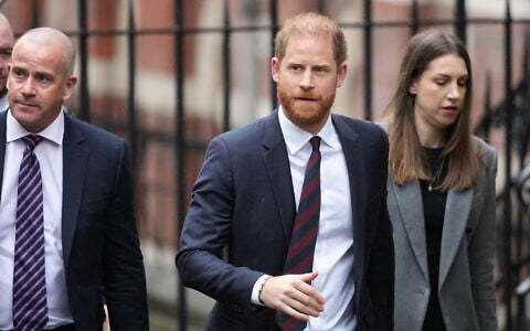 Britain’s Prince Harry arrives at London’s High Court to lead a group, including Elton John and Elizabeth Hurley, accusing the Daily Mail’s publisher of privacy invasion through unlawful tactics in a trial that is part of a wider phone hacking scandal in London, January 21, 2026. (AP Photo/Kirsty Wigglesworth)