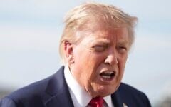 US President Donald Trump speaks with reporters before boarding Air Force One, August 21, 2026, at Joint Base Andrews, Maryland, en route to South Carolina. (AP Photo/Jacquelyn Martin)