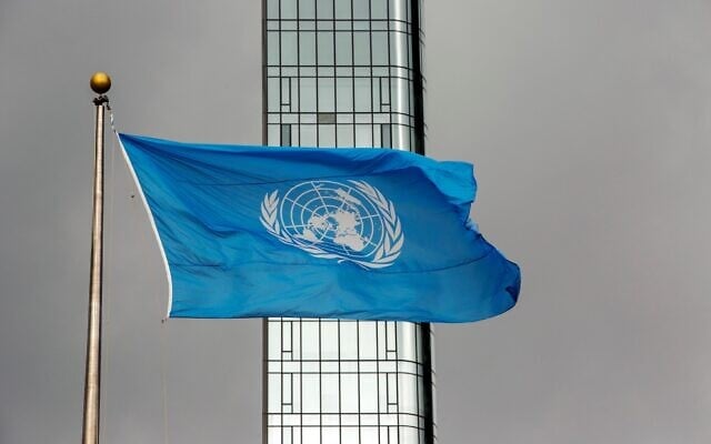 The UN flag flies on a stormy day at the United Nations during the United Nations General Assembly, September 22, 2022. (AP Photo/Ted Shaffrey)