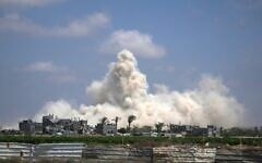 The Israeli army demolishes buildings east of Deir al-Balah, central Gaza Strip, August 22, 2026. (AP Photo/Abdel Kareem Hana)