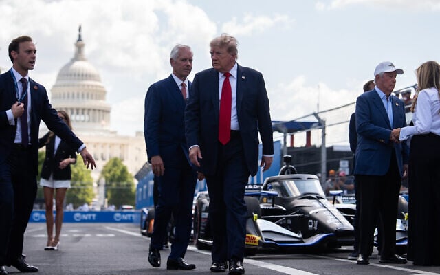 US President Donald Trump arrives at the Freedom 250 Grand Prix auto race, August 23, 2026, in Washington. (AP Photo/Julia Demaree Nikhinson)