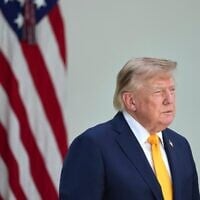US President Donald Trump listens during a back to school event in the Rose Garden of the White House, August 24, 2026, in Washington. (AP Photo/Alex Brandon)