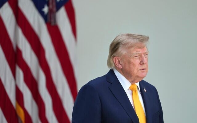 US President Donald Trump listens during a back to school event in the Rose Garden of the White House, August 24, 2026, in Washington. (AP Photo/Alex Brandon)