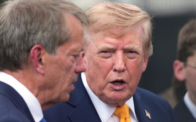 President Donald Trump speaks with Nebraska Gov. Jim Pillen after a back to school event in the Rose Garden of the White House, August 24, 2026, in Washington. (AP Photo/Alex Brandon)