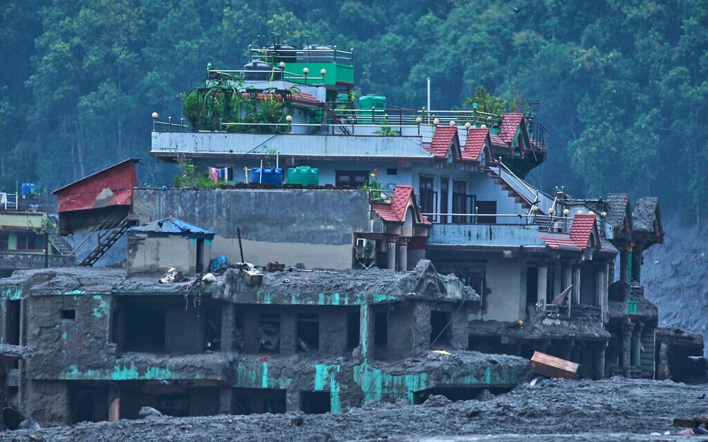 Rescue teams race to find survivors of Nepal flash floods as risk of fresh flooding grows