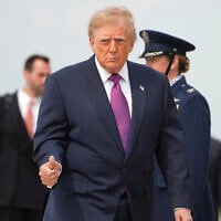 US President Donald Trump walks to board Air Force One, August 27, 2026, at Joint Base Andrews, Maryland. (AP/Mark Schiefelbein)