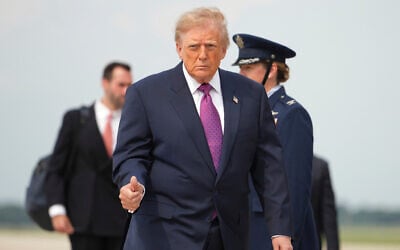 US President Donald Trump walks to board Air Force One, August 27, 2026, at Joint Base Andrews, Maryland. (AP/Mark Schiefelbein) US President Donald Trump walks to board Air Force One, August 27, 2026, at Joint Base Andrews, Maryland. (AP/Mark Schiefelbein)