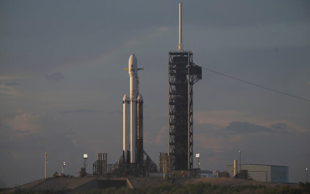 NASA’s Nancy Grace Roman Space Telescope, encapsulated in a protective payload fairing atop a SpaceX Falcon Heavy rocket, is seen at sunrise, August 29, 2026, at Launch Complex 39A at NASA’s Kennedy Space Center in Florida. (Joel Kowsky/NASA via AP)