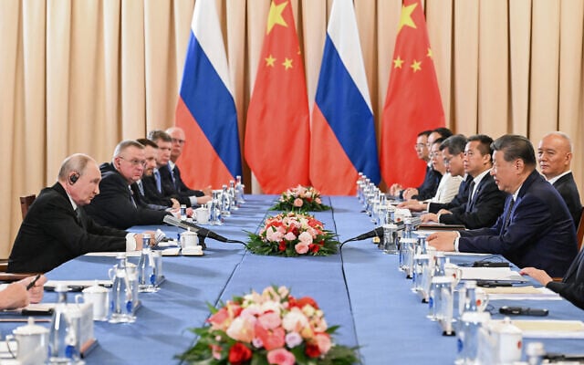 Russian President Vladimir Putin, left, and China’s President Xi Jinping attend a meeting on the sidelines of the Shanghai Cooperation Organization (SCO), in Bishkek, Kyrgyzstan, on August 31, 2026. (Kristina Solovyova, Sputnik, Kremlin Pool Photo via AP)