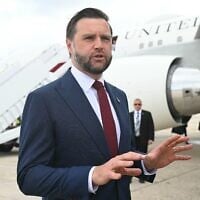 US Vice President JD Vance speaks to reporters before boarding Air Force Two at Joint Base Andrews, Maryland, August 31, 2026. (Saul Loeb/Pool Photo via AP)