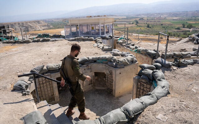 An IDF soldier walks in a fortified army post on the border between Jordan and the West Bank, July 27, 2026. (Emanuel Fabian/Times of Israel)