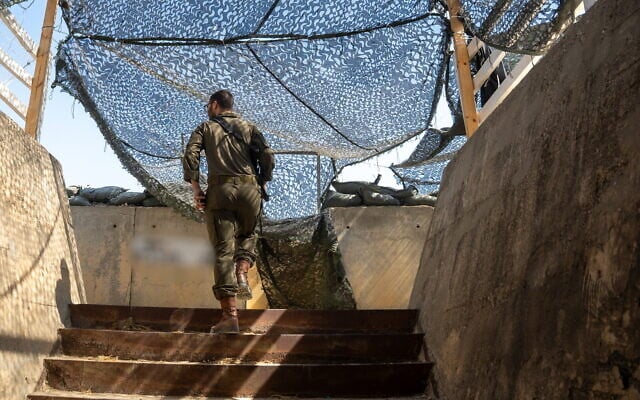 An IDF soldier walks in a fortified army post on the border between Jordan and the West Bank, July 27, 2026. (Emanuel Fabian/Times of Israel)
