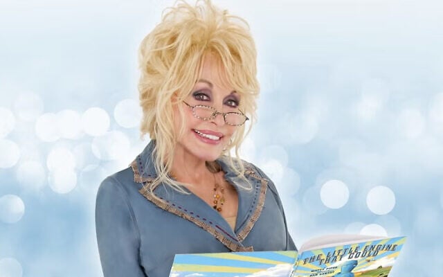 Dolly Parton reading a children's book, in an undated photo. (The Dollywood Foundation)