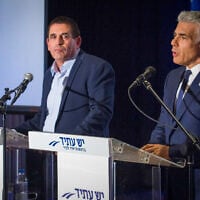 Chairman of the Yesh Atid party Yair Lapid and new member of the Yesh Atid party Yoav Segalovitz presenting the new project, titled “Nachshon Plan” during a joint press conference in Tel Aviv, April 3, 2017. (Flash90)