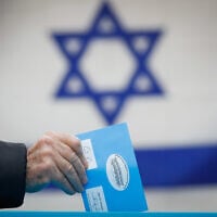 A ballot is cast at a voting station in Jerusalem, during the Knesset election, on March 2, 2020. (Olivier Fitoussi/Flash90/File)