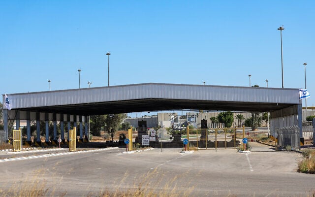 Trucks and humanitarian aid to the Gaza Strip seen at the Kerem Shalom Crossing, on the Israeli side of the border with the Gaza Strip, May 29, 2025. (Flash90)