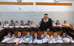 Young students in a classroom in the ultra-Orthodox Mea Shearim neighborhood of Jerusalem, August 25, 2025. (Chaim Goldberg/Flash90)